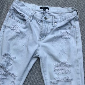 Kendal and Kylie ripped mom/ boyfriend jeans